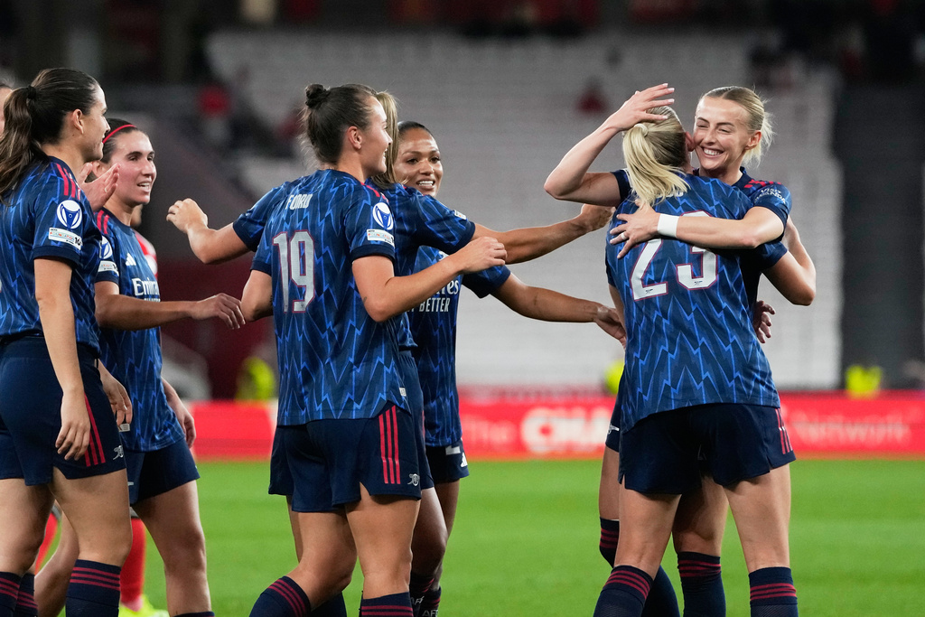 Arsenal's Alessia Russo, second right, celebrates with teammates after scoring her side's second goal during the women's Champions League opening phase soccer match between SL Benfica and Arsenal at the Luz Stadium, in Lisbon, Portugal, Thursday, Oct. 16, 2025. (AP Photo/Armando Franca)