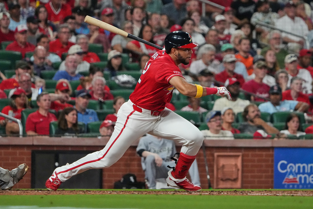 St. Louis Cardinals' Joshua Báez follows through on an RBI single before heading to second on the throw during the third inning of a baseball game against the Chicago White Sox Friday, Sept. 11, 2026, in St. Louis. (AP Photo/Jeff Roberson)