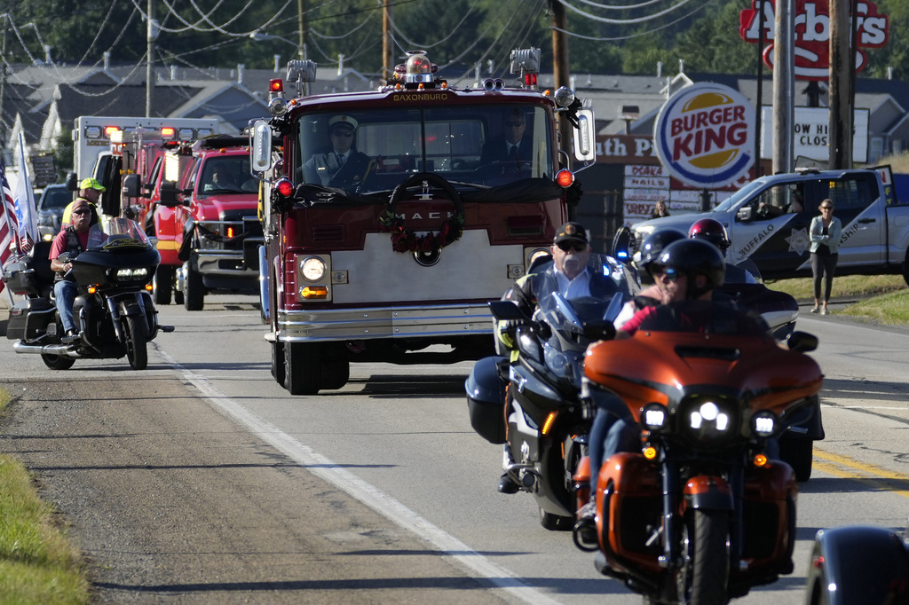 Hundreds of firefighters gather for funeral of former chief killed in ...
