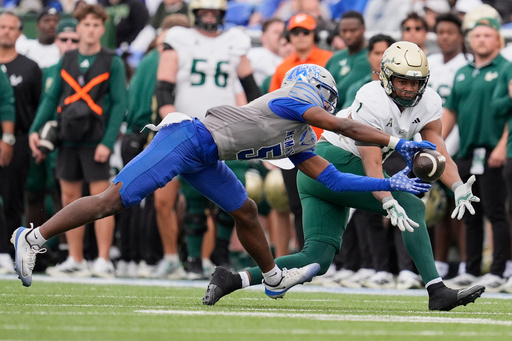 Memphis defensive back Chris Bracy (5) breaks up a pass intended for South Florida tight end Jonathan Echols (1) during the first half of an NCAA college football game Saturday, Oct. 25, 2025, in Memphis, Tenn. (AP Photo/George Walker IV) Memphis defensive back Chris Bracy (5) breaks up a pass intended for South Florida tight end Jonathan Echols (1) during the first half of an NCAA college football game Saturday, Oct. 25, 2025, in Memphis, Tenn. (AP Photo/George Walker IV)