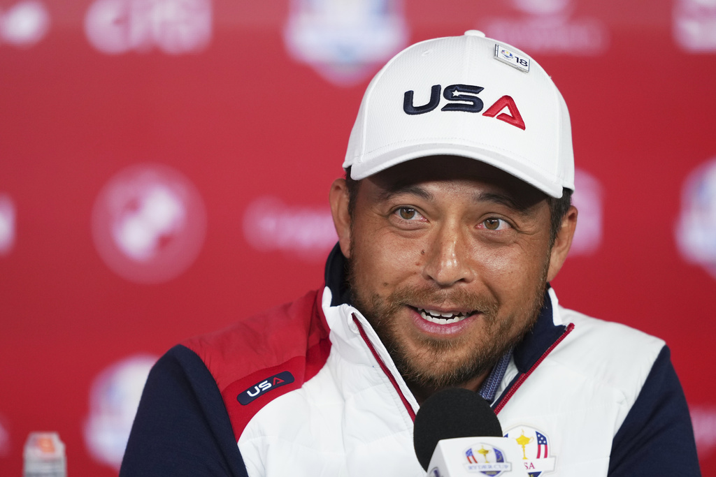 United States' Xander Schauffele speaks during a news conference before a practice round at the Ryder Cup golf tournament, Tuesday, Sept. 23, 2025, in Farmingdale, N.Y., at Bethpage State Park's Black Course between the United States and Europe. (AP Photo/Linsey Wasson)