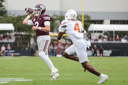 Mississippi State quarterback Blake Shapen, left, looks to throw a pass as Texas defensive back Jelani McDonald (4) pursues during the first half of an NCAA college football game in Starkville, Miss., Saturday, Oct. 25, 2025. (AP Photo/James Pugh) Mississippi State quarterback Blake Shapen, left, looks to throw a pass as Texas defensive back Jelani McDonald (4) pursues during the first half of an NCAA college football game in Starkville, Miss., Saturday, Oct. 25, 2025. (AP Photo/James Pugh)