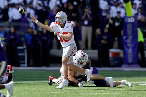 Ohio State quarterback Julian Sayin (10) passes against the Washington during the first half of an NCAA college football game, Saturday, Sept. 27, 2025, in Seattle. (AP Photo/John Froschauer) Ohio State quarterback Julian Sayin (10) passes against the Washington during the first half of an NCAA college football game, Saturday, Sept. 27, 2025, in Seattle. (AP Photo/John Froschauer)