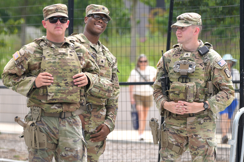 National Guard members patrol near the National Mall, Monday, July 20, 2026, in Washington. (AP Photo/Mariam Zuhaib)