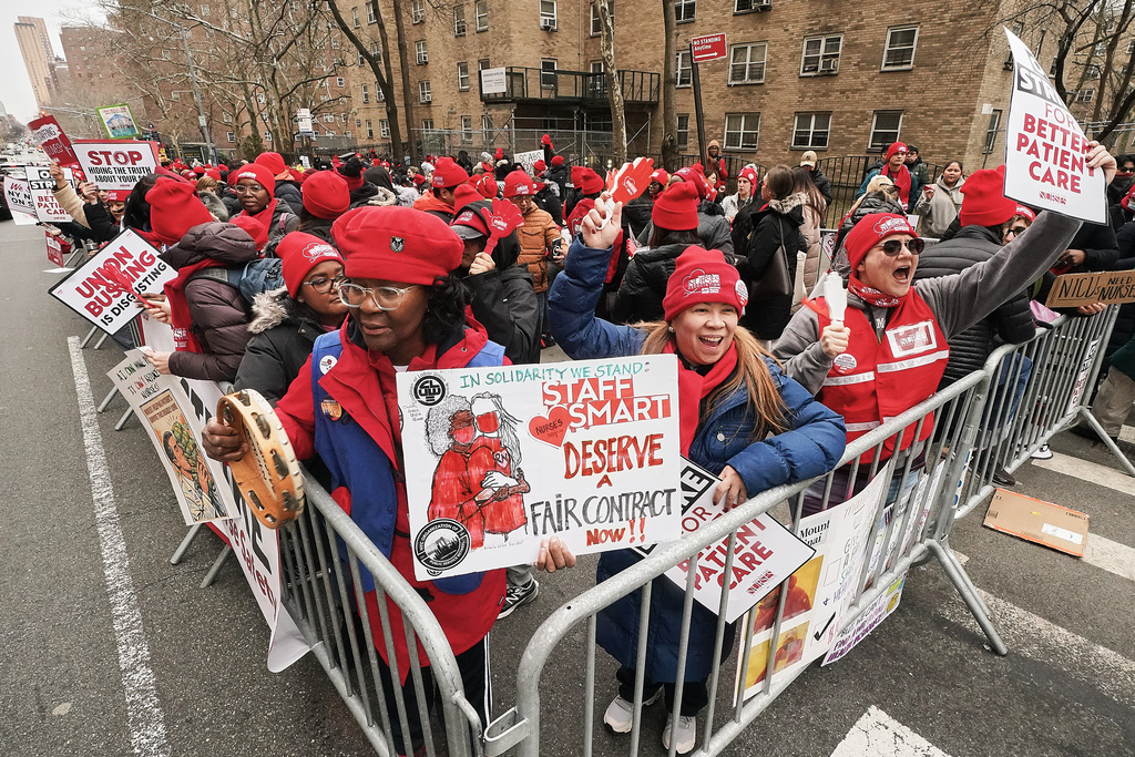 Striking nurses demonstrate outside Mt. Sinai Hospital, in New York, Wednesday, Jan. 14, 2026. (AP Photo/Richard Drew)