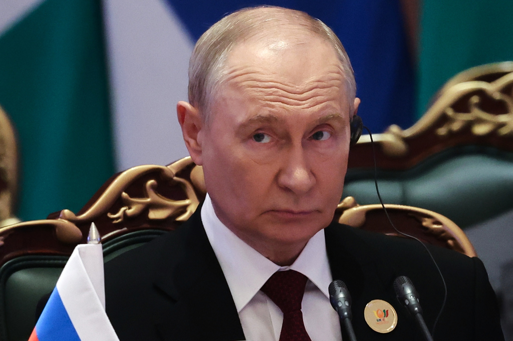 Russian President Vladimir Putin attends a session of the BRICS Plus Outreach format in New Delhi, India, on Sunday, Sept. 13, 2026. (Alexander Kazakov, Sputnik, Kremlin Pool Photo via AP)