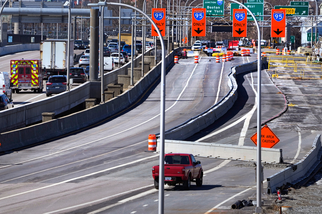 FILE - Diverted traffic passes a closed portion of Washington Bridge, March 8, 2024, in East Providence, R.I. (AP Photo/Charles Krupa, File)