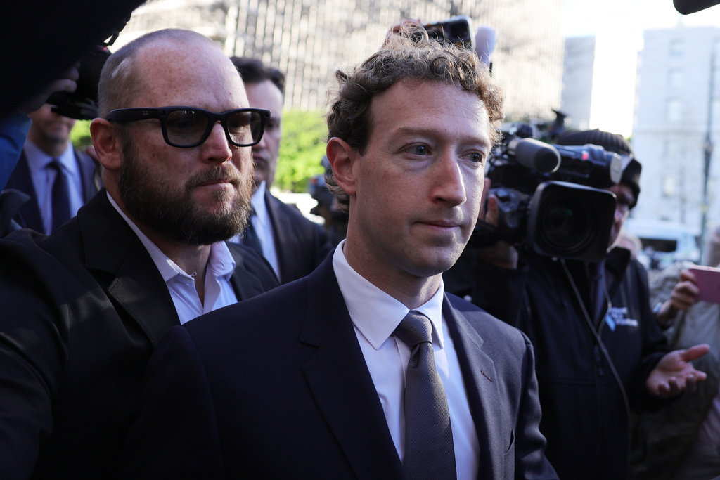 Meta CEO Mark Zuckerberg arrives for a landmark trial over whether social media platforms deliberately addict and harm children, Wednesday, Feb. 18, 2026, in Los Angeles. (AP Photo/Ryan Sun)