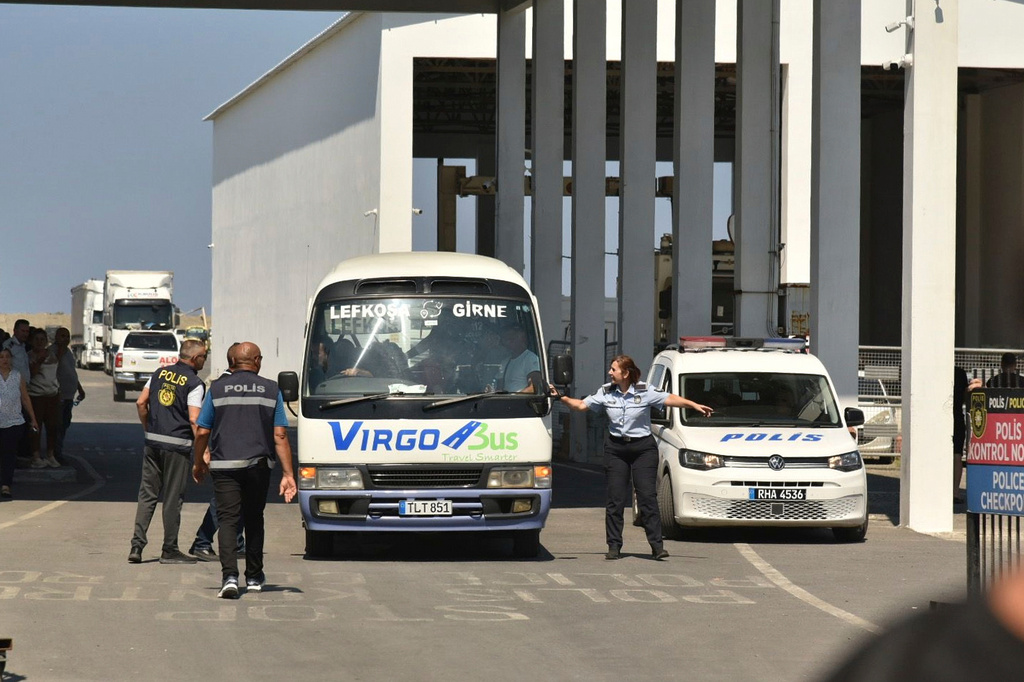 Survivors of a catamaran-style ferry which was capsized off the coast of northern Cyprus arrive at the port of Kyrenia in the Turkish occupied northern part of Cyprus, Sunday, Aug. 30, 2026. (AP Photo)