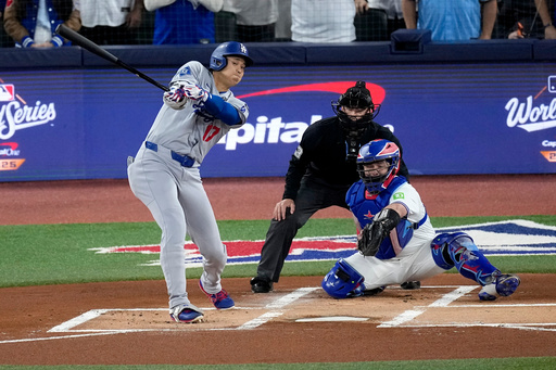Los Angeles Dodgers' Shohei Ohtani strikes out during the first inning in Game 1 of baseball's World Series against the Toronto Blue Jays, Friday, Oct. 24, 2025, in Toronto. (AP Photo/David J. Phillip) Los Angeles Dodgers' Shohei Ohtani strikes out during the first inning in Game 1 of baseball's World Series against the Toronto Blue Jays, Friday, Oct. 24, 2025, in Toronto. (AP Photo/David J. Phillip)