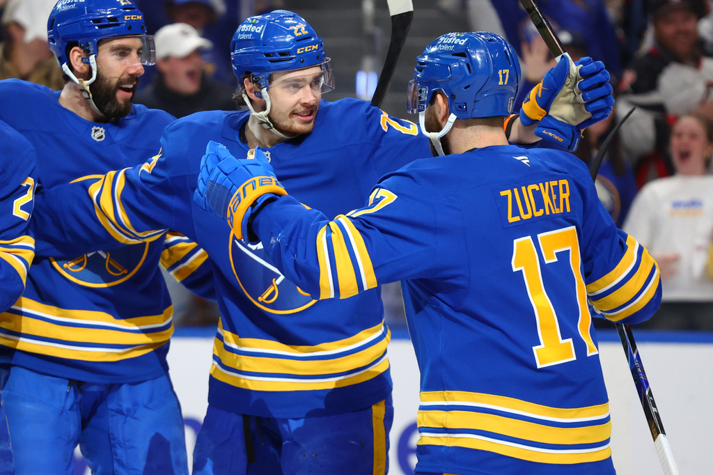 Buffalo Sabres left wing Jason Zucker (17) celebrates his goal with right wing Jack Quinn (22) during the first period in Game 5 of a second-round NHL hockey Stanley Cup playoff series against the Montreal Canadiens, Thursday, May 14, 2026, in Buffalo, N.Y. (AP Photo/Jeffrey T. Barnes)