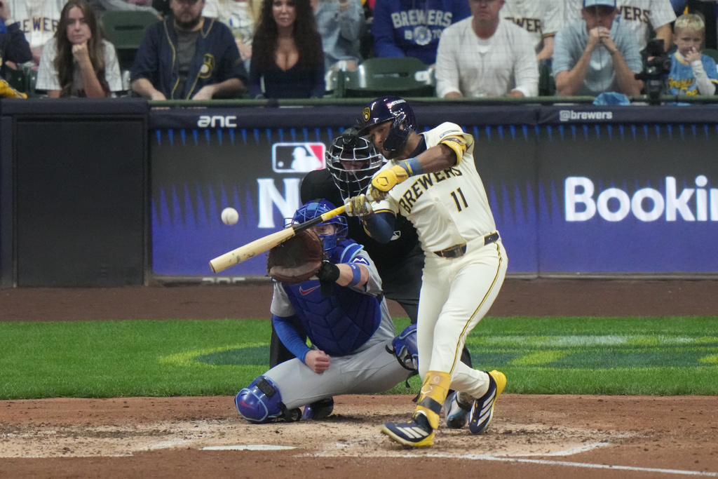 Milwaukee Brewers' Jackson Chourio (11) hits a 3-run home run during the fourth inning of Game 2 of baseball's National League Division Series against the Chicago Cubs Monday, Oct. 6, 2025, in Milwaukee. (AP Photo/Morry Gash)