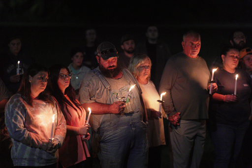 Residents attend a vigil honoring the victims of a blast at an explosives plant, Accurate Energetic Systems, on Friday, Oct. 10, 2025, in Centerville Tenn. (AP Photo/Obed Lamy) Residents attend a vigil honoring the victims of a blast at an explosives plant, Accurate Energetic Systems, on Friday, Oct. 10, 2025, in Centerville Tenn. (AP Photo/Obed Lamy)