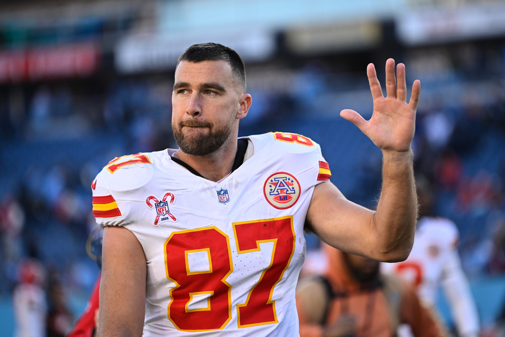 Kansas City Chiefs tight end Travis Kelce waves to fans as he walks off the field after an NFL football game against the Tennessee Titans, Sunday, Dec. 21, 2025, in Nashville, Tenn. (AP Photo/John Amis)