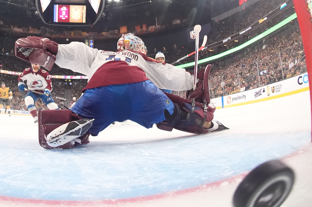 Colorado Avalanche goaltender Scott Wedgewood is scored on by Vegas Golden Knights center Tomas Hertl during the third period in Game 3 of the Western Conference finals NHL hockey Stanley Cup playoff series Sunday, May 24, 2026, in Las Vegas. (AP Photo/Mark J. Terrill)