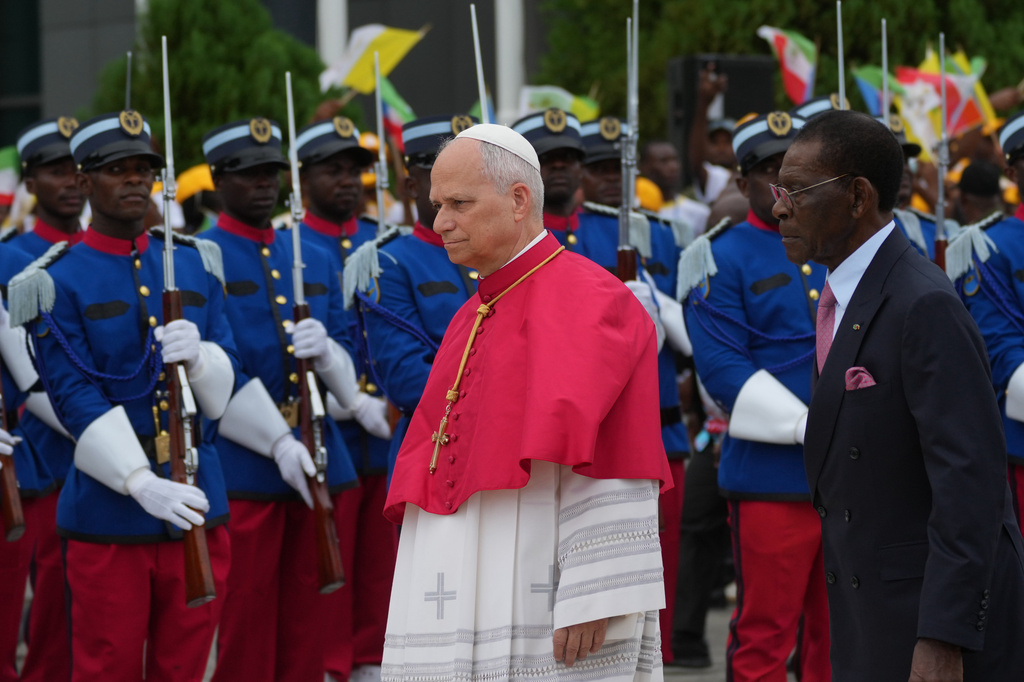 Pope Leo XIV is welcomed by Equatorial Guinea's President Teodoro Obiang Nguema Mbasogo, right, upon his arrival at Malabo International Airport in Malabo, Equatorial Guinea, Tuesday, April 21, 2026, on the ninth day of his 11-day pastoral visit to Africa. (AP Photo/Andrew Medichini)
