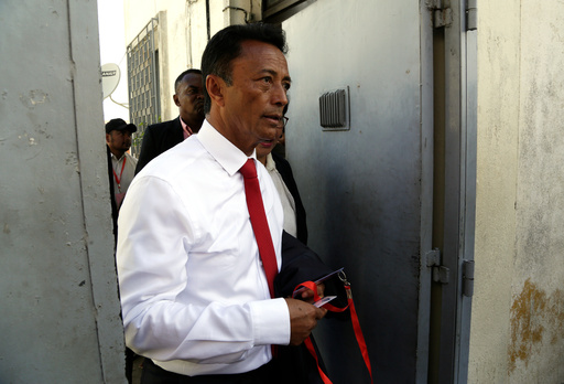 FILE - Presidential candidate Marc Ravalomanana leaves the polling station after casting his vote in the runoff presidential election in Antananarivo, Madagascar, Dec. 19, 2018. (AP Photo/Themba Hadebe, File) FILE - Presidential candidate Marc Ravalomanana leaves the polling station after casting his vote in the runoff presidential election in Antananarivo, Madagascar, Dec. 19, 2018. (AP Photo/Themba Hadebe, File)