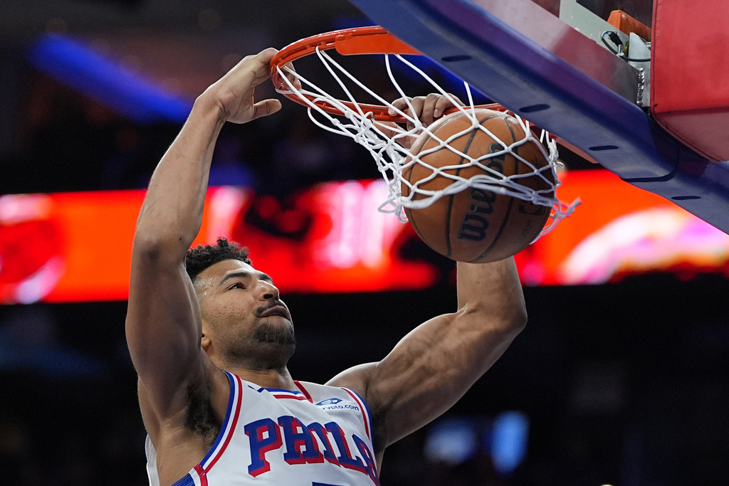 Philadelphia 76ers' Quentin Grimes dunks during the second half of an NBA basketball game against the Brooklyn Nets, Saturday, March 14, 2026, in Philadelphia. (AP Photo/Matt Rourke)