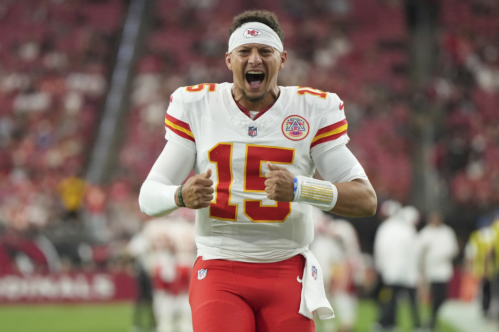 Kansas City Chiefs quarterback Patrick Mahomes (15) yells prior to an NFL preseason football game against the Arizona Cardinals, Saturday, Aug. 9, 2025, in Glendale. (AP Photo/Rick Scuteri)