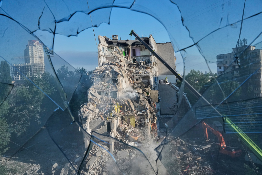 A residential apartment building is seen damaged after a Russian strike on Kyiv, Ukraine, Thursday, July 2, 2026. (AP Photo/Efrem Lukatsky)