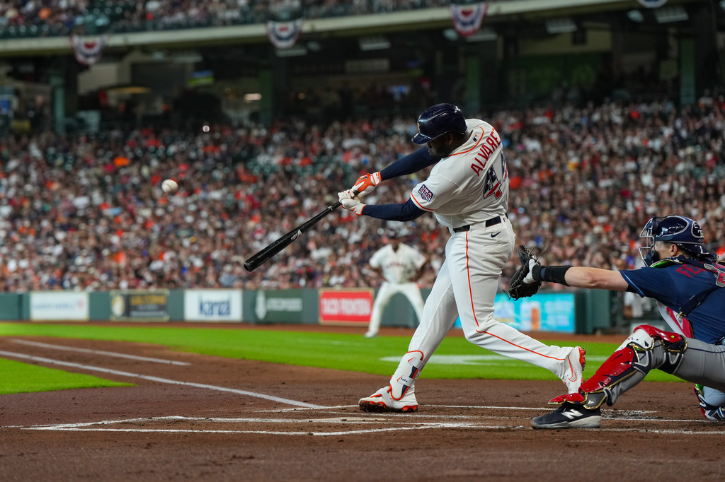 Houston Astros' Yordan Alvarez hits a home run during the first inning of a baseball game against the Tampa Bay Rays in Houston, Saturday, July 4, 2026. (AP Photo/Jon Shapley)