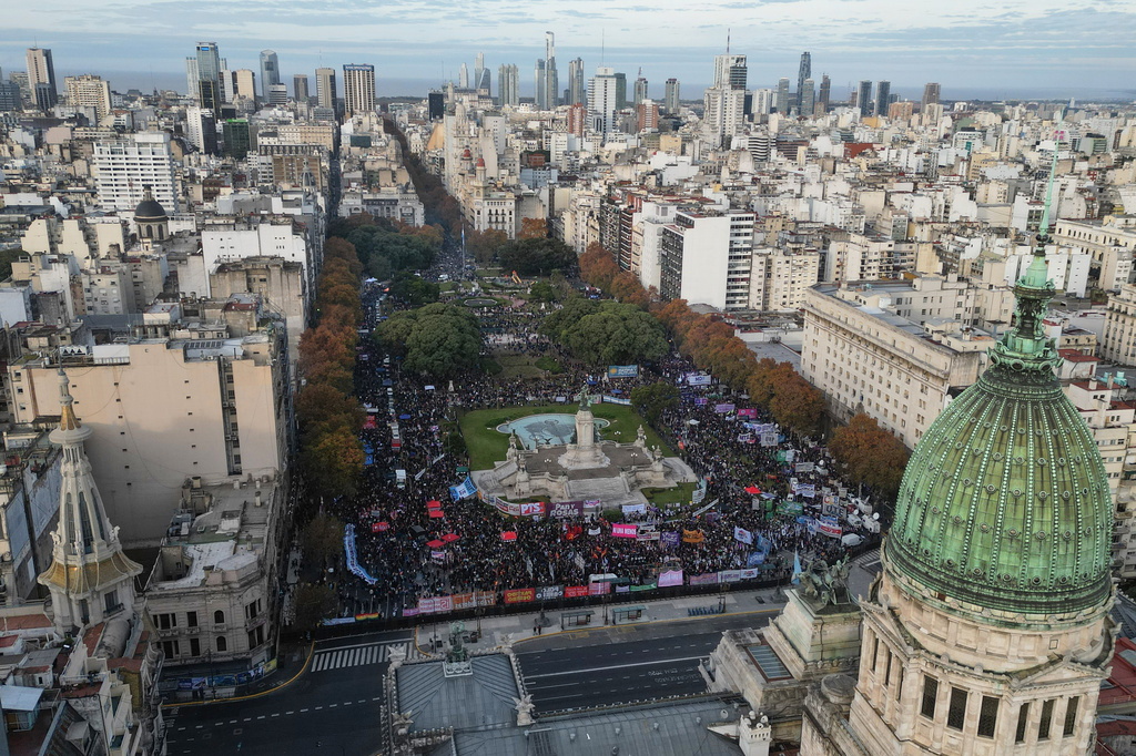 Demonstrators gather outside Congress during a march marking the anniversary of the "Ni Una Menos" (Not One Fewer) women's movement in Buenos Aires, Argentina, Wednesday, June 3, 2026. (AP Photo/Natacha Pisarenko)