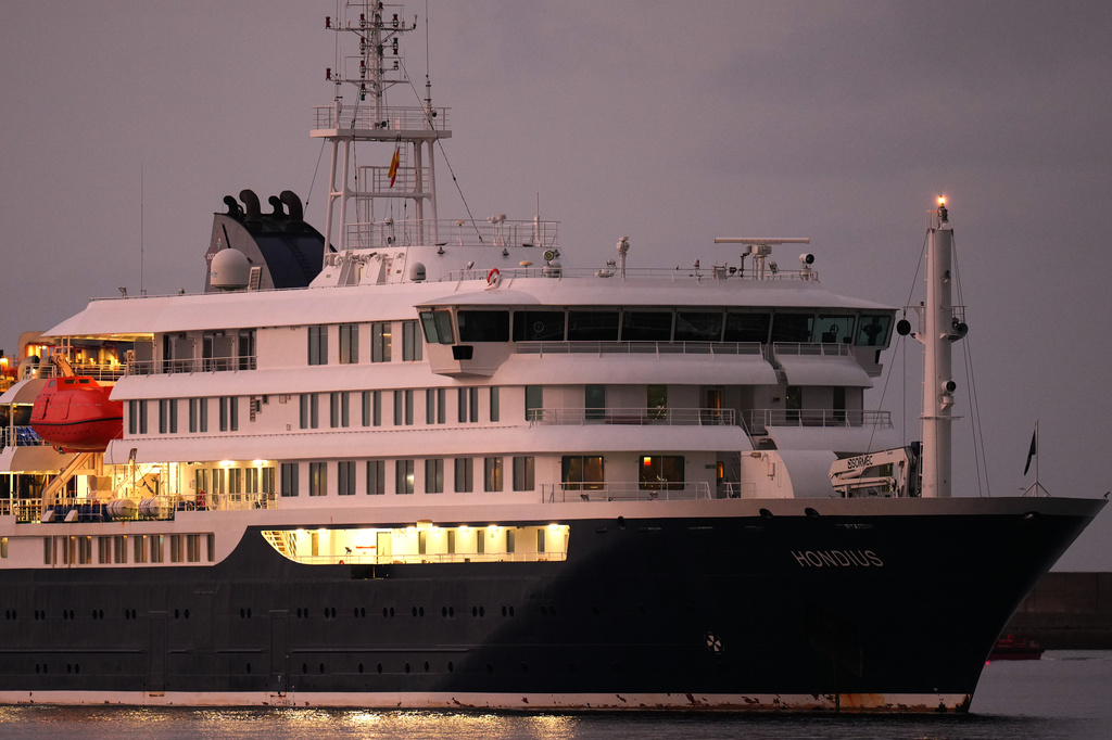 The hantavirus-stricken cruise ship MV Hondius is seen at anchor after arriving at the port of Granadilla in Tenerife, Canary Islands, Spain, Sunday, May 10, 2026. (AP Photo/Manu Fernandez)