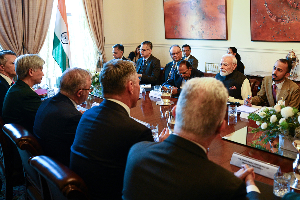 India's Prime Minister Narendra Modi, second right, talks to Australian Prime Minster Anthony Albanese, third left, during the Annual Leaders' Summit at Government House in Melbourne, Australia, Thursday, July 9, 2026. (Izhar Khan Pool via AP)