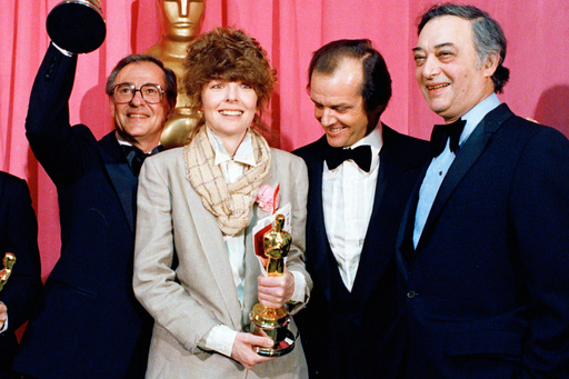 FILE - Oscar winners Charles H. Joffe, winner of best picture for "Annie Hall," left, and Diane Keaton, winner of best actress for "Annie Hall," poses with presenter Jack Nicholson, and producer Jack Rollins at the Academy Awards in Los Angeles on April 3, 1978. (AP Photo, File) FILE - Oscar winners Charles H. Joffe, winner of best picture for "Annie Hall," left, and Diane Keaton, winner of best actress for "Annie Hall," poses with presenter Jack Nicholson, and producer Jack Rollins at the Academy Awards in Los Angeles on April 3, 1978. (AP Photo, File)