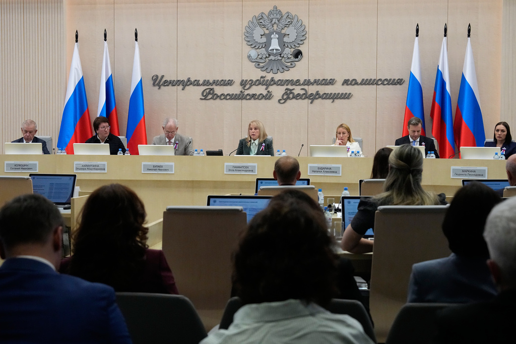 Ella Pamfilova, head of Russia's Central Election Commission, center, reports the official results of Russia's parliamentary elections at the commission's meeting in Moscow, Russia, Friday, Sept. 25, 2026. (AP Photo/Alexander Zemlianichenko)