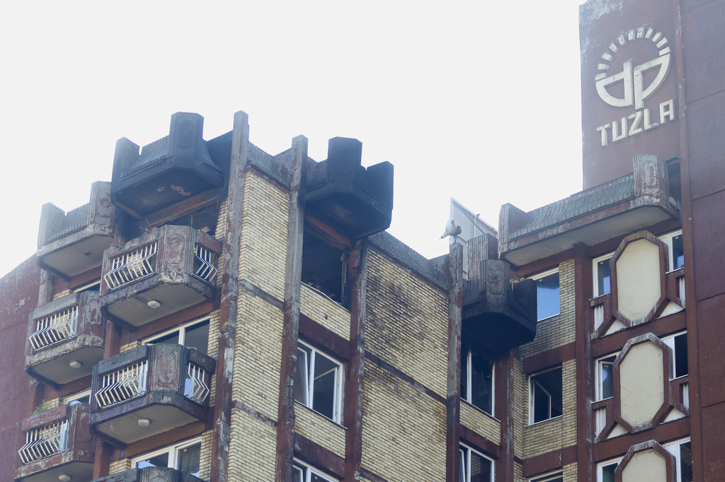 A view of burned balcony and windows at a retirement home following a major fire that killed at least 11 people, in Tuzla, Bosnia, Tuesday, Nov. 5, 2025. (AP Photo)