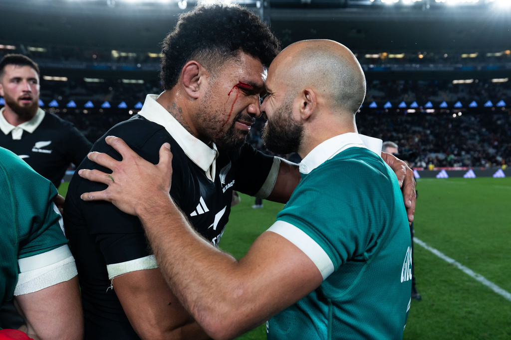 New Zealand's Ardie Savea, left, and Ireland's Jamison Gibson-Park, do a hongi, a traditional Maori greeting, after their Nations Championship rugby international test match in Auckland, New Zealand, Saturday, July 18, 2026. (Brett Phibbs/Photosport via AP)