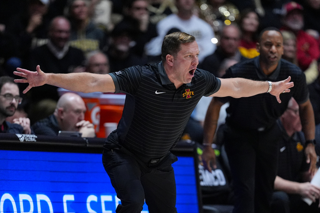 Iowa State head coach T.J. Otzelberger gestures during the first half of an NCAA college basketball game against Purdue in West Lafayette, Ind., Saturday, Dec. 6, 2025. (AP Photo/Michael Conroy)