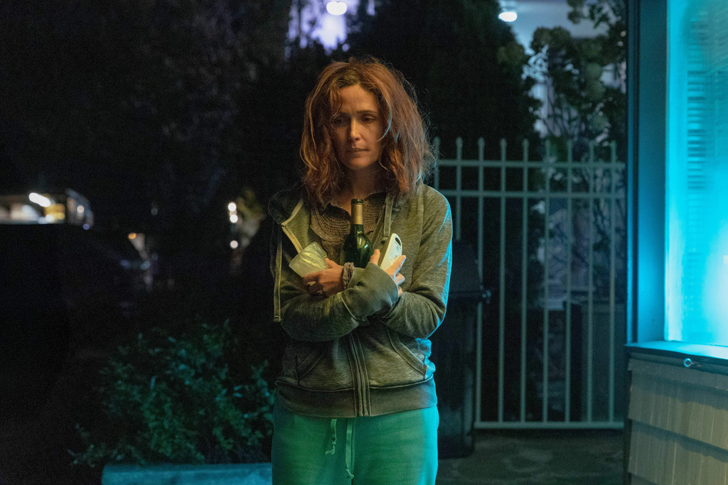 This image released by A24 shows Rose Byrne in a scene from " If I Had Legs I'd Kick You." (Logan White/A24 via AP)
