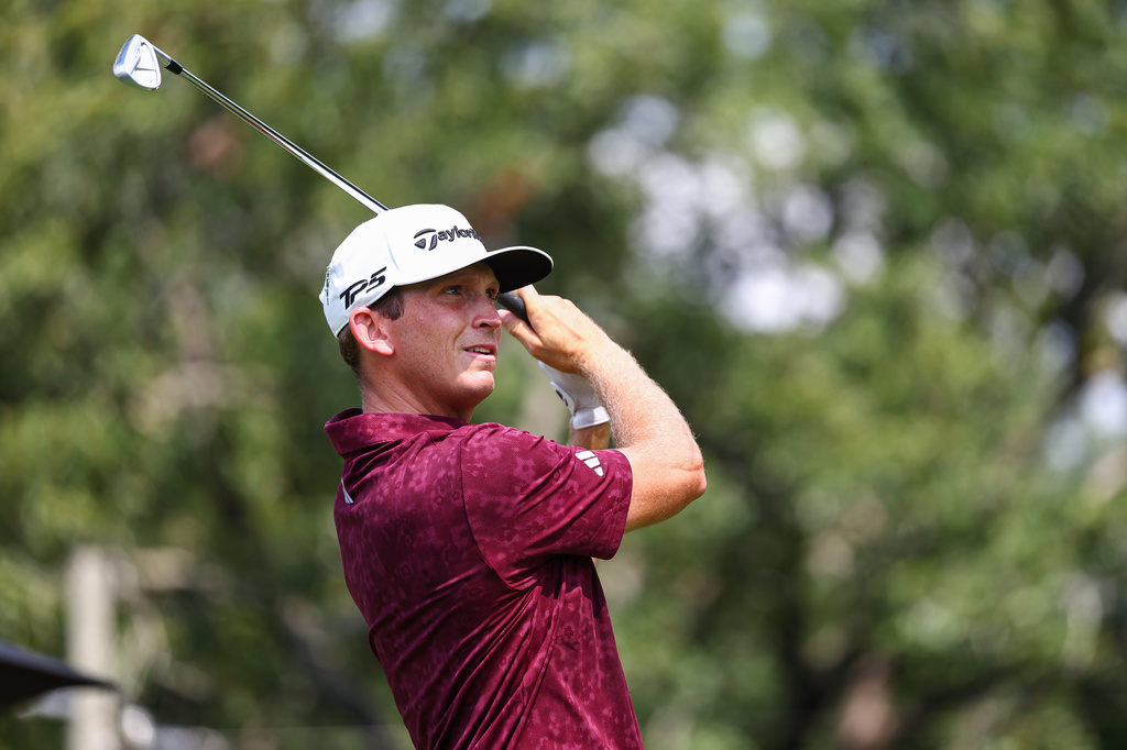 Jacob Bridgeman plays his tee shot on the second hole during the second round of the Tour Championship golf tournament, Friday, Aug. 28, 2026, in Atlanta. (AP Photo/Colin Hubbard)