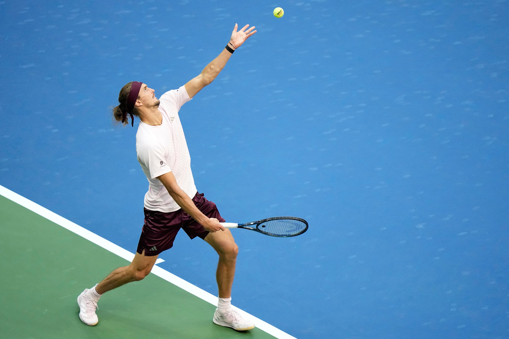 Alexander Zverev, of Germany, serves the ball to Karen Khachanov, of Russia, during the men's singles semifinals of the U.S. Open tennis championships Friday, Sept. 11, 2026, in New York. (AP Photo/Frank Franklin II)