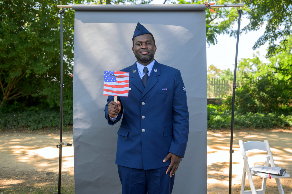 New U.S. citizen U.S. Air Force senior airman Stephen Kissi, from Ghana, poses for a portrait following a naturalization ceremony on Independence Day at George Washington's Mount Vernon, Saturday, July 4, 2026, in Alexandria, Va. (AP Photo/Rod Lamkey, Jr.)