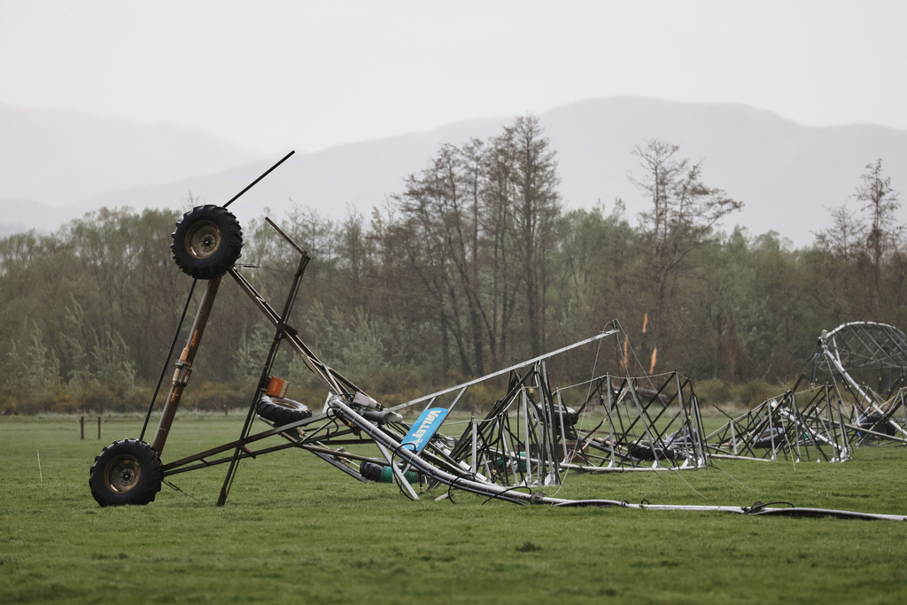 Farm irrigation equipment lays on the ground after it is damaged by strong winds in Waiau, New Zealand, Thursday, Oct. 23, 2025. (Chris Skelton/STUFF via AP)