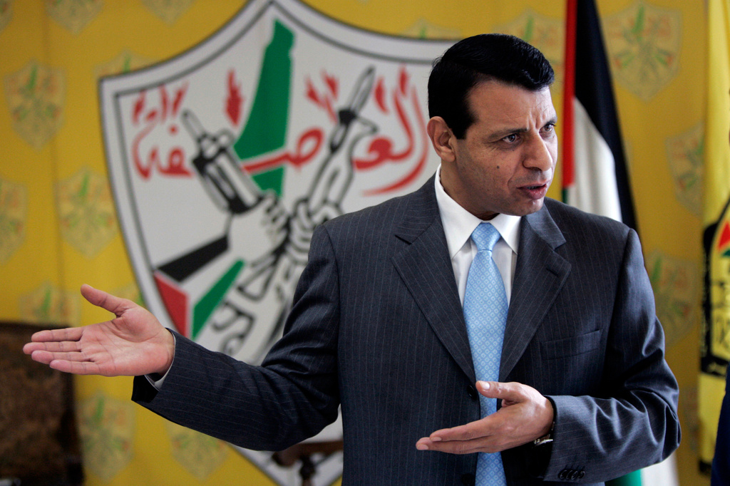 FILE - Palestinian Fatah leader Mohammed Dahlan gestures in his office in the West Bank city of Ramallah on Jan. 3, 2011. (AP Photo/Majdi Mohammed, File)