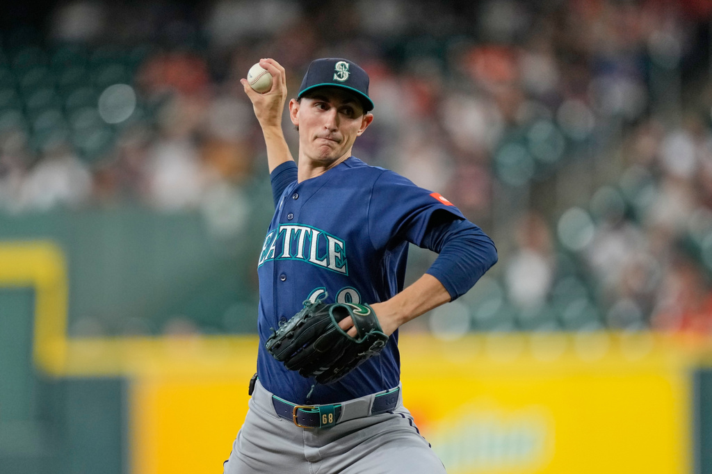 Seattle Mariners starting pitcher George Kirby throws against the Houston Astros during the first inning of a baseball game Monday, May 11, 2026, in Houston. (AP Photo/David J. Phillip)