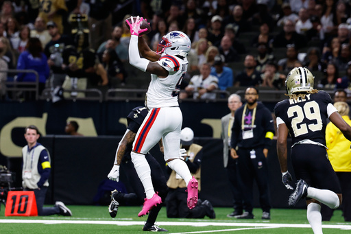 New England Patriots wide receiver Kayshon Boutte, left, catches a ball before running for a touchdown against New Orleans Saints cornerback Quincy Riley during the first half of an NFL football game, Sunday, Oct. 12, 2025, in New Orleans. (AP Photo/Butch Dill) New England Patriots wide receiver Kayshon Boutte, left, catches a ball before running for a touchdown against New Orleans Saints cornerback Quincy Riley during the first half of an NFL football game, Sunday, Oct. 12, 2025, in New Orleans. (AP Photo/Butch Dill)