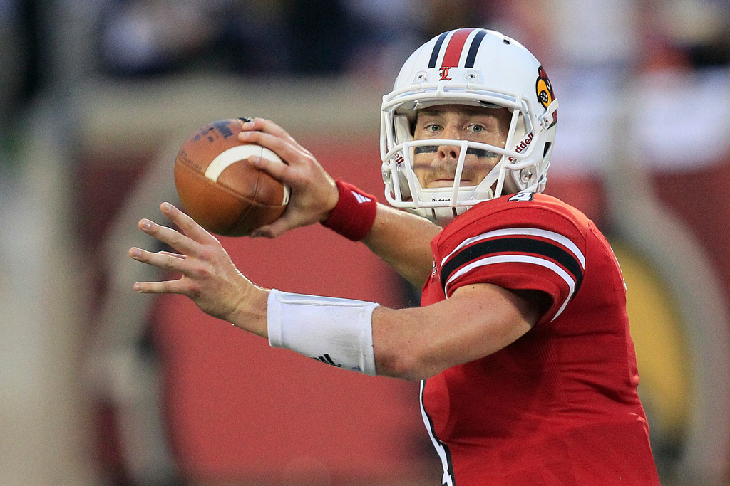 FILE - Louisville quarterback Will Stein readies a pass during the first half of their NCAA college football game against Florida International, Sept. 9, 2011, in Louisville, Ky. (AP Photo/Ed Reinke, File)