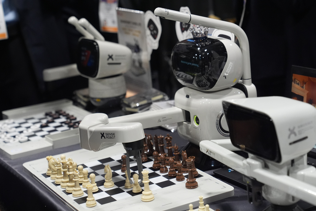 A chess-playing robot is pictured at a SenseRobot booth during the CES Unveiled tech show Sunday, Jan. 4, 2026, in Las Vegas. (AP Photo/Abbie Parr)