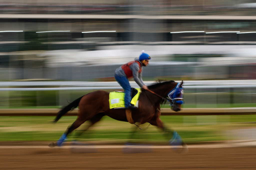 Kentucky Derby entrant So Happy works out at Churchill Downs Monday, April 27, 2026, in Louisville, Ky. (AP Photo/Charlie Riedel)