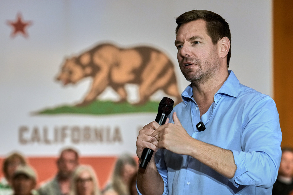 FILE - Rep. Eric Swalwell, D-Calif., appears at a town hall meeting in Sacramento, Calif., April 7, 2026. (AP Photo/Rich Pedroncelli, File)