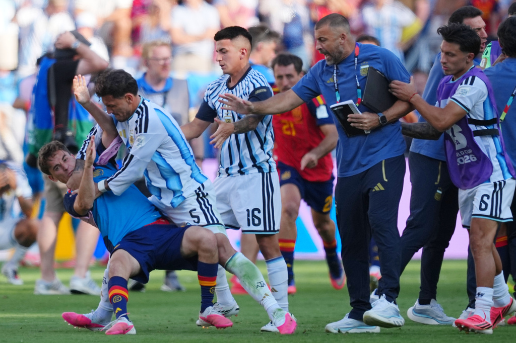 FILE - Argentina's Leandro Paredes (5) knocks down Spain's Gavi (9) during scuffle after the World Cup final soccer match between Spain and Argentina in East Rutherford, N.J., near New York, Sunday, July 19, 2026. (AP Photo/Julio Cortez, File)