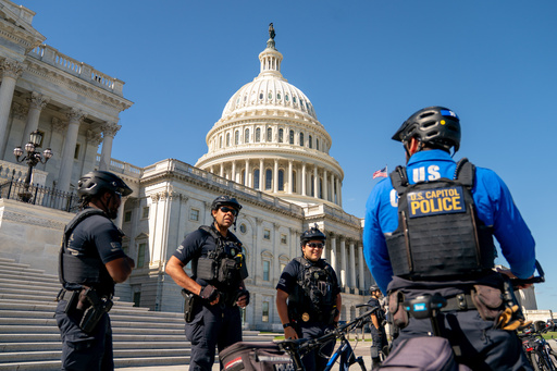 U.S. Capitol Police monitor the perimeter of the Capitol on the ninth day of the government shutdown, Thursday, Oct. 9, 2025 in Washington. (AP Photo/Allison Robbert) U.S. Capitol Police monitor the perimeter of the Capitol on the ninth day of the government shutdown, Thursday, Oct. 9, 2025 in Washington. (AP Photo/Allison Robbert)