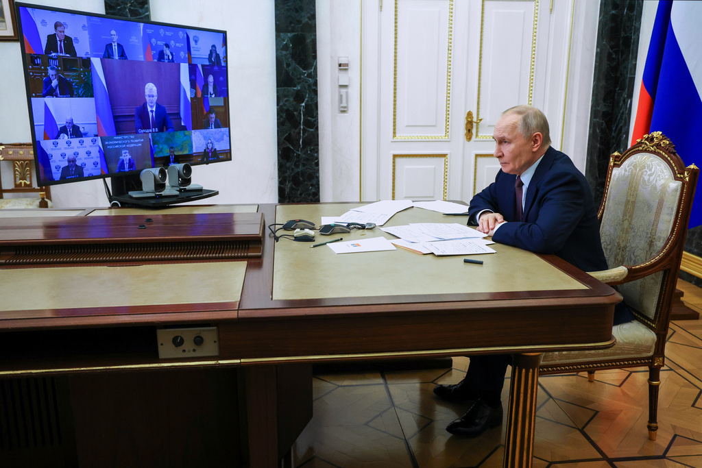 Russian President Vladimir Putin attends a cabinet meeting via videoconference at the Kremlin, in Moscow, Russia, Wednesday, Jan. 21, 2026. (Vyacheslav Prokofyev/Sputnik, Kremlin Pool Photo via AP)