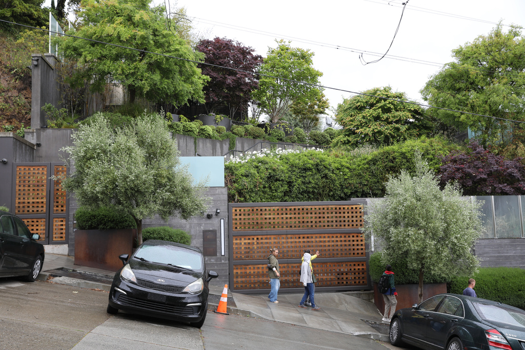 Pedestrians walk on Lombard Street past a driveway at the home of Sam Altman in San Francisco on Friday, April 10, 2026. (Lea Suzuki/San Francisco Chronicle via AP)