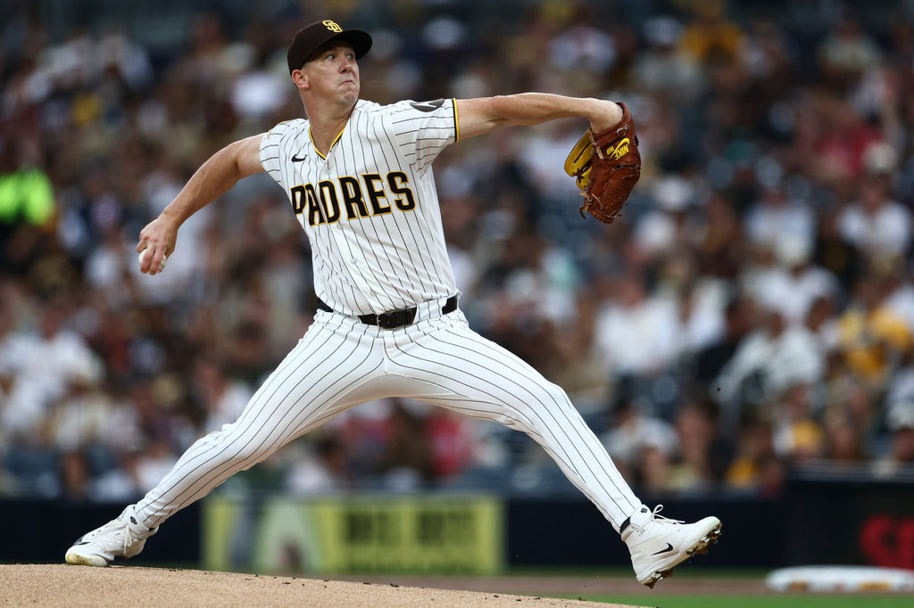 San Diego Padres starting pitcher Walker Buehler works against an Arizona Diamondbacks batter in the first inning of a baseball game Saturday, Sept. 26, 2026, in San Diego. (AP Photo/Karl Anderson)